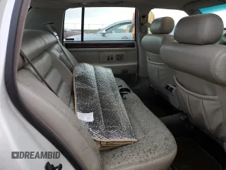 1995 Cadillac Concours z VIN 1G6KF52Y3SU270555, wystawiony jako Copart lot #76318254 z przebiegiem Nie podano mil oraz Szkody całkowita. Historia ofert i sprzedaży dostępna na DreamBid. Obrazek 10.