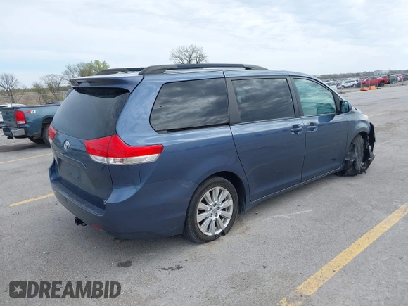 2014 Toyota Sienna Limited with VIN 5TDDK3DC5ES077601, listed as a IAAI auction lot 42163071 with 168,000 mi miles and . Bid and sale history available at DreamBid. Image 4.