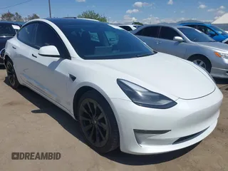 2022 Tesla Model 3 Long Range with VIN 5YJ3E1EB1NF289719, listed as a IAAI auction lot 41968273 with 73,368 mi miles and . Bid and sale history available at DreamBid. Image 1.