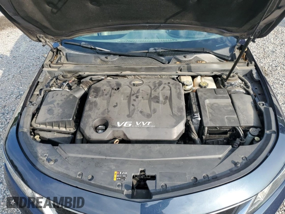 2017 Chevrolet Impala Premier with VIN 2G1145S34H9146294, listed as a Copart auction lot 59054975 with 115,128 mi miles and Salvage title. Bid and sale history available at DreamBid. Image 11.
