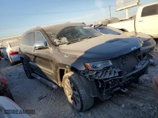 2017 Jeep Grand Cherokee Overland with VIN 1C4RJECG2HC614746, listed as a Copart auction lot 77362304 with 86,330 mi miles and Salvage Title. Bid and sale history available at carsss.com. Image 4.