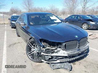 2016 BMW 7 Series 740i with VIN WBA7E2C58GG738548, listed as a IAAI auction lot 41706822 with 33,246 mi miles. Bid and sale history available at carsss.com. Image 1.