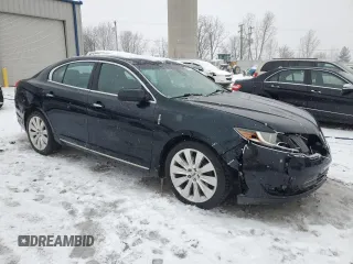 2014 Lincoln MKS EcoBoost with VIN 1LNHL9FT6EG608602, listed as a Copart auction lot 87018254 with 124,329 mi miles and Clean title. Bid and sale history available at DreamBid. Image 4.
