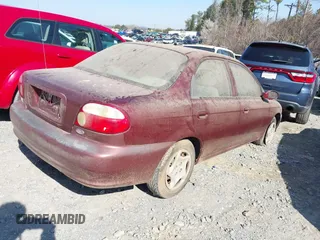 2001 Kia Sephia z VIN KNAFB121715045535, wystawiony jako IAAI lot #41765390 z przebiegiem 128 815 mil mil oraz . Historia ofert i sprzedaży dostępna na DreamBid. Obrazek 4.