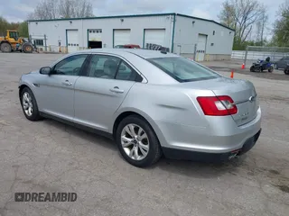 2012 Ford Taurus SEL z VIN 1FAHP2EW1CG134363, wystawiony jako IAAI lot #42180692 z przebiegiem 163 193 mil mil oraz . Historia ofert i sprzedaży dostępna na DreamBid. Obrazek 3.