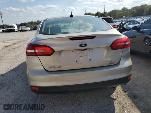 2018 Ford Focus SE z VIN 1FADP3FE8JL331853, wystawiony jako Copart lot #74013984 z przebiegiem 73 237 mil mil oraz Szkoda całkowita • Salvage title. Historia ofert i sprzedaży dostępna na DreamBid. Obrazek 6.