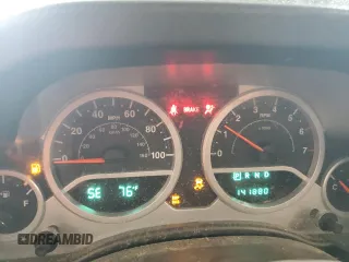 2009 Jeep Wrangler Sahara with VIN 1J4FA54159L772622, listed as a Copart auction lot 55648305 with 141,880 mi miles and Salvage title. Bid and sale history available at DreamBid. Image 9.