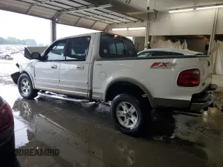 2003 Ford F-150 XLT with VIN 1FTRW08L23KA65560, listed as a Copart auction lot 61349145 with 207,887 mi miles and Salvage title. Bid and sale history available at DreamBid. Image 2.
