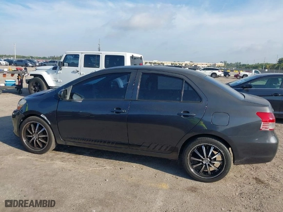 2010 Toyota Yaris with VIN JTDBT4K34A1377764, listed as a IAAI auction lot 41759405 with 154,226 mi miles. Bid and sale history available at carsss.com. Image 14.
