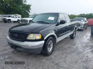 2003 Ford F-150 XL with VIN 1FTRX17L13NA01819, listed as a IAAI auction lot 42719787 with Not provided miles and . Bid and sale history available at DreamBid. Image 2.