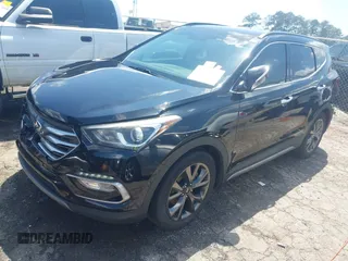 2017 Hyundai Santa Fe Ultimate z VIN 5NMZW4LA1HH052430, wystawiony jako IAAI lot #42205489 z przebiegiem 85 720 mil mil oraz . Historia ofert i sprzedaży dostępna na DreamBid. Obrazek 2.