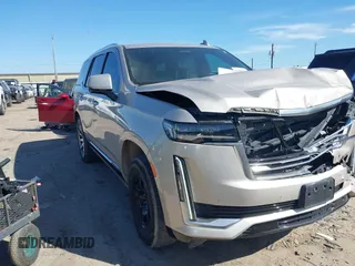 2021 Cadillac Escalade Premium Luxury Platinum z VIN 1GYS4DKL7MR370983, wystawiony jako IAAI lot #41683604 z przebiegiem 65 740 mil mil oraz . Historia ofert i sprzedaży dostępna na DreamBid. Obrazek 1.