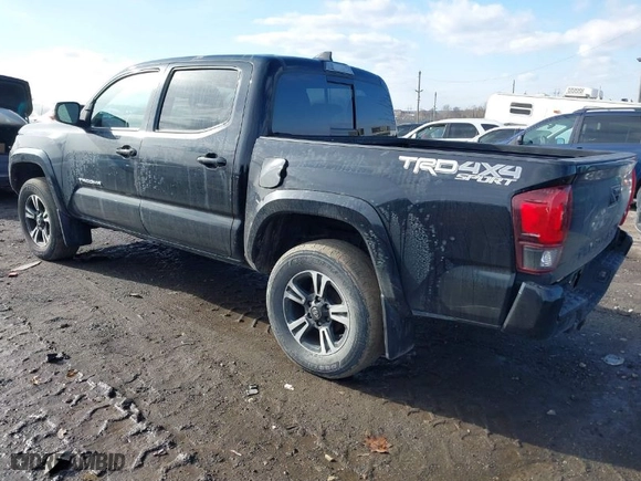 2019 Toyota Tacoma 4WD SR with VIN 3TMCZ5ANXKM200572, listed as a IAAI auction lot 41504215 with 142,375 mi miles. Bid and sale history available at carsss.com. Image 3.