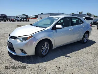 2014 Toyota Corolla L with VIN 5YFBURHE3EP048512, listed as a Copart auction lot 60905855 with 101,113 mi miles and Salvage title. Bid and sale history available at DreamBid. Image 1.