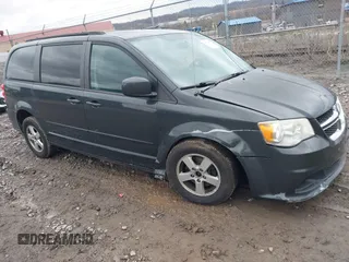 2012 Dodge Grand Caravan SXT with VIN 2C4RDGCG8CR242235, listed as a IAAI auction lot 41922083 with 124,306 mi miles and . Bid and sale history available at DreamBid. Image 1.