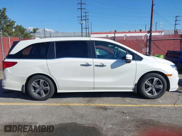 2018 Honda Odyssey Touring with VIN 5FNRL6H8XJB019122, listed as a IAAI auction lot 41820212 with 144,014 mi miles. Bid and sale history available at carsss.com. Image 14.