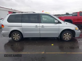 2004 Honda Odyssey EX-L with VIN 5FNRL18934B016420, listed as a IAAI auction lot 41473237 with 188,659 mi miles and . Bid and sale history available at DreamBid. Image 13.
