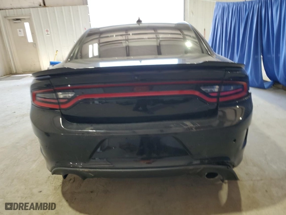 2021 Dodge Charger R/T with VIN 2C3CDXCTXMH522057, listed as a Copart auction lot 49062435 with 106,417 mi miles and Clean Title. Bid and sale history available at carsss.com. Image 6.