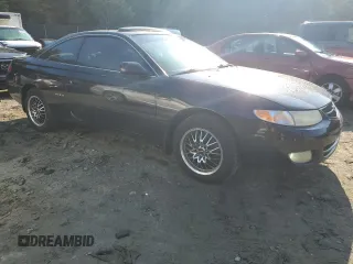 2000 Toyota Solara SE with VIN 2T1CF28P1YC327887, listed as a Copart auction lot 72334924 with 289,977 mi miles and Salvage Title. Bid and sale history available at DreamBid. Image 4.
