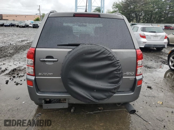 2009 Suzuki Grand Vitara z VIN JS3TD044794100716, wystawiony jako Copart lot #58739065 z przebiegiem 151 638 mil mil oraz Szkoda całkowita • Salvage title. Historia ofert i sprzedaży dostępna na DreamBid. Obrazek 6.