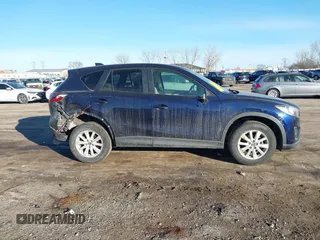 2014 Mazda CX-5 Touring with VIN JM3KE2CY8E0375009, listed as a IAAI auction lot 41420045 with 138,404 mi miles. Bid and sale history available at carsss.com. Image 13.