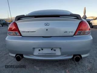 2005 Hyundai Tiburon GT z VIN KMHHN65F05U171038, wystawiony jako Copart lot #87765735 z przebiegiem 113 129 mil mil oraz Szkody całkowita. Historia ofert i sprzedaży dostępna na DreamBid. Obrazek 6.