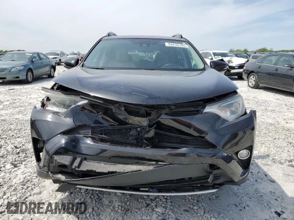 2018 Toyota RAV4 XLE with VIN 2T3WFREV2JW458816, listed as a Copart auction lot 53235105 with 135,469 mi miles and Salvage Title. Bid and sale history available at DreamBid. Image 5.