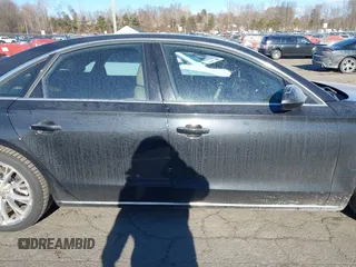 2011 Audi A8 с VIN WAUAVAFDXBN025061, выставлен на аукционе IAAI как лот 41326516 с пробегом 198 850 миль миль и . История ставок и продаж доступна на DreamBid. Изображение 13.