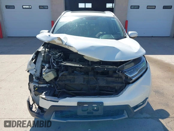 2018 Honda CR-V Touring with VIN 2HKRW2H92JH662753, listed as a IAAI auction lot 39538586 with 83,202 mi miles. Bid and sale history available at carsss.com. Image 13.