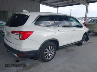 2019 Honda Pilot EX-L with VIN 5FNYF6H57KB011649, listed as a IAAI auction lot 41880951 with 99,504 mi miles. Bid and sale history available at carsss.com. Image 4.