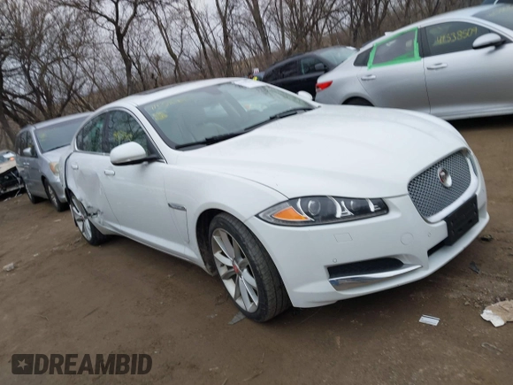 2015 Jaguar XF V6 Portfolio with VIN SAJWJ0FF2F8U59934, listed as a IAAI auction lot 41558305 with 120,219 mi miles. Bid and sale history available at carsss.com. Image 1.