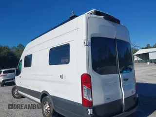 2022 Ford Transit Cargo with VIN 1FTBW3U85NKA01097, listed as a IAAI auction lot 41076643 with 24,786 mi miles and . Bid and sale history available at DreamBid. Image 3.