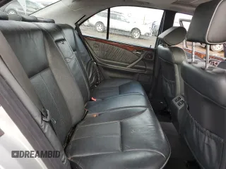 2002 Mercedes-Benz E-Class with VIN WDBJF65J22B464517, listed as a Copart auction lot 82488204 with 217,069 mi miles and Salvage Title. Bid and sale history available at carsss.com. Image 10.