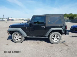 2016 Jeep Wrangler Willys Wheeler z VIN 1C4AJWAG9GL257621, wystawiony jako IAAI lot #41432306 z przebiegiem 84 248 mil mil oraz . Historia ofert i sprzedaży dostępna na DreamBid. Obrazek 14.
