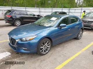 2018 Mazda 3 Touring z VIN 3MZBN1L38JM235604, wystawiony jako IAAI lot #42333995 z przebiegiem 69 541 mil mil oraz . Historia ofert i sprzedaży dostępna na DreamBid. Obrazek 2.