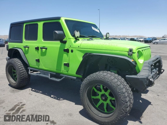 2018 Jeep Wrangler Unlimited Sport with VIN 1C4HJXDG7JW115516, listed as a Copart auction lot 58231735 with 52,992 mi miles and Salvage title. Bid and sale history available at DreamBid. Image 4.
