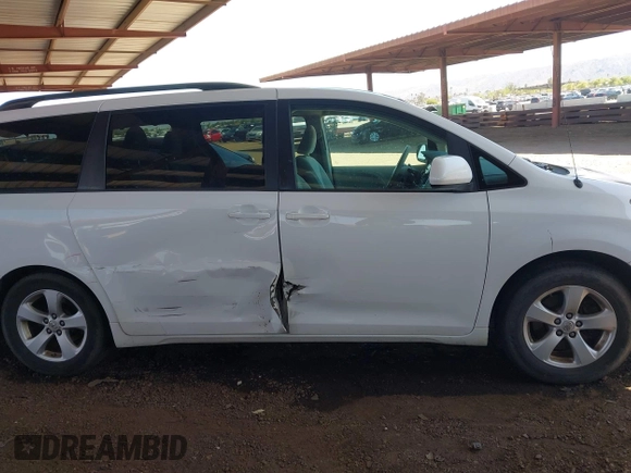 2012 Toyota Sienna LE AAS with VIN 5TDKK3DC4CS274117, listed as a IAAI auction lot 42008690 with 205,353 mi miles. Bid and sale history available at carsss.com. Image 13.