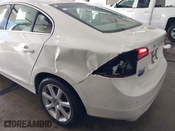 2016 Volvo S60 T5 Drive-E Premier with VIN YV126MFKXG2410966, listed as a IAAI auction lot 41308772 with 262,816 mi miles. Bid and sale history available at carsss.com. Image 18.