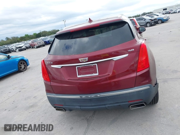 2017 Cadillac XT5 FWD with VIN 1GYKNARS2HZ107587, listed as a IAAI auction lot 41614842 with 124,611 mi miles and . Bid and sale history available at carsss.com. Image 16.