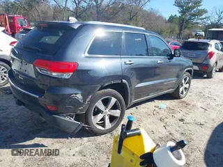 2014 Jeep Grand Cherokee Limited with VIN 1C4RJEBT5EC189033, listed as a IAAI auction lot 41156781 with 126,367 mi miles and . Bid and sale history available at DreamBid. Image 4.