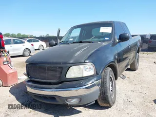 1999 Ford F-150 XL with VIN 1FTRX18L3XKA77743, listed as a IAAI auction lot 42512532 with Not provided miles and . Bid and sale history available at DreamBid. Image 2.