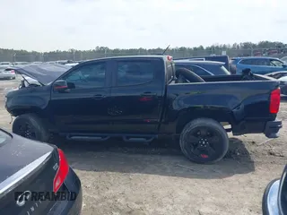 2021 Chevrolet Colorado 2WD LT with VIN 1GCGSCEA6M1283709, listed as a IAAI auction lot 41791122 with 58,893 mi miles and . Bid and sale history available at DreamBid. Image 14.
