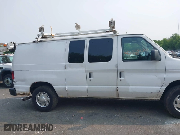 2011 Ford Econoline Cargo Commercial with VIN 1FTNE2ELXBDA18412, listed as a IAAI auction lot 42328684 with 115,484 mi miles and . Bid and sale history available at DreamBid. Image 14.