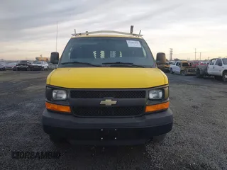 2014 Chevrolet Express Cargo Van with VIN 1GCWGFCA7E1150041, listed as a IAAI auction lot 41387426 with 185,480 mi miles. Bid and sale history available at carsss.com. Image 12.