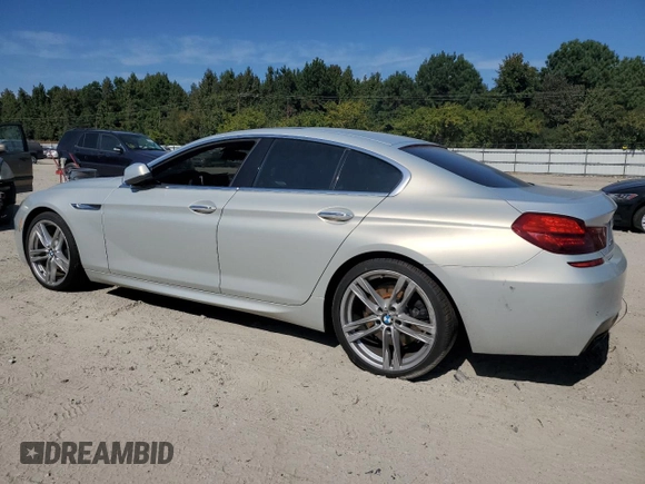 2013 BMW 6 Series 650i xDrive with VIN WBA6B4C54DD098738, listed as a Copart auction lot 75511714 with 81,581 mi miles and Salvage Title. Bid and sale history available at carsss.com. Image 2.