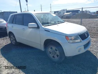 2010 Suzuki Grand Vitara Premium z VIN JS3TE0D21A4110383, wystawiony jako IAAI lot #41878698 z przebiegiem 143 925 mil mil oraz . Historia ofert i sprzedaży dostępna na DreamBid. Obrazek 1.