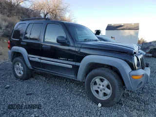 2002 Jeep Liberty Sport with VIN 1J4GL48K42W156247, listed as a Copart auction lot 86321124 with 0 mi miles and Salvage Title. Bid and sale history available at carsss.com. Image 4.