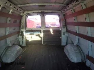 2000 GMC Savana z VIN 1GTFG25M5Y1902825, wystawiony jako Copart lot #81948164 z przebiegiem 275 963 mil mil oraz Czysty tytuł • Clean title. Historia ofert i sprzedaży dostępna na DreamBid. Obrazek 10.