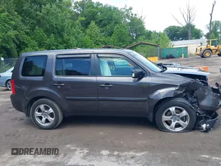 2012 Honda Pilot EX-L z VIN 5FNYF4H79CB026760, wystawiony jako IAAI lot #42277545 z przebiegiem 154 148 mil mil oraz . Historia ofert i sprzedaży dostępna na DreamBid. Obrazek 13.