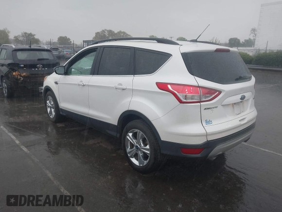 2016 Ford Escape SE with VIN 1FMCU0GX4GUC23998, listed as a IAAI auction lot 41917522 with 96,491 mi miles and . Bid and sale history available at carsss.com. Image 3.